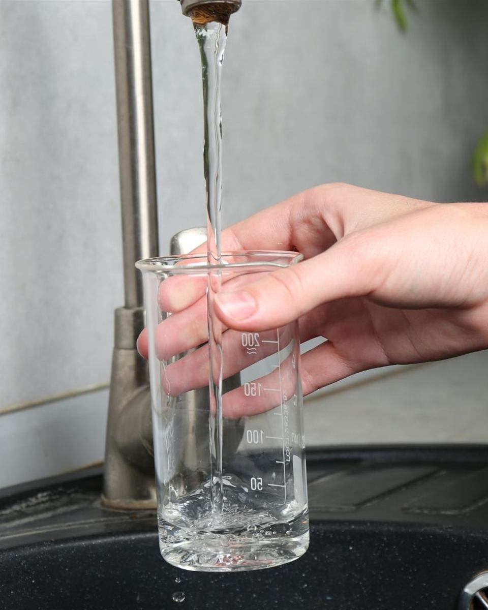 Central Piedmont Plumbing technician servicing a well pressure tank at a Summerfield, NC property